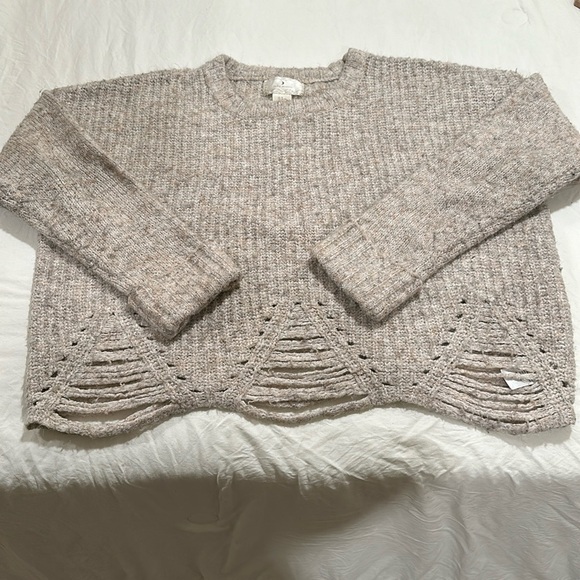 Sweater with distressing. Has a slight crop to it. Well loved with lots of life. - Picture 1 of 3